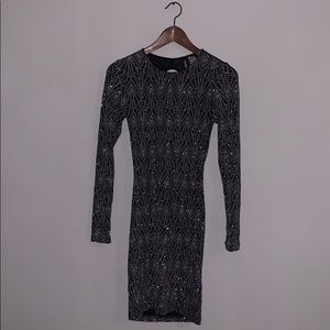 Long sleeve dress with an open back